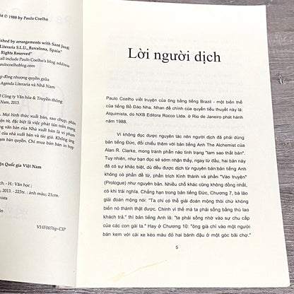 The Alchemist By Paulo Coelho Vietnamese Edition Nhà Giả Kim 2013 Paperpar Book